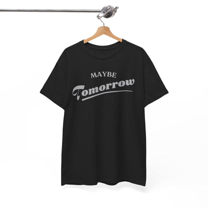 Exquisite black Maybe Tomorrow T-shirt displayed on a wooden hanger, featuring a refined graphic in light grey text, embodying a playful yet stylish procrastination theme.
