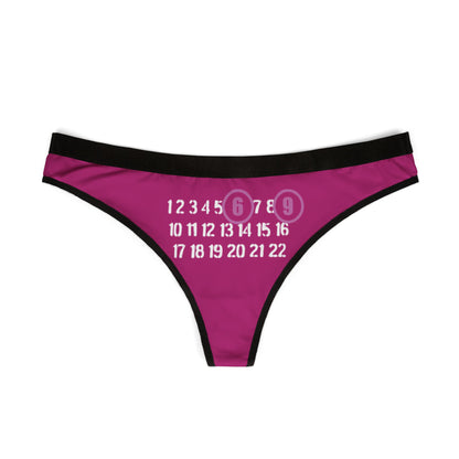Elegant playful thong showcasing bold numbers in a charming pinkish-purple hue against a vibrant background, perfect for the daring woman.