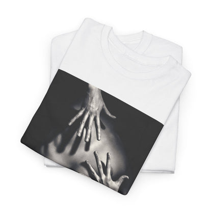 Folded luxury white graphic t-shirt showcasing a striking black and white design of hands on a nude torso, embodying elegance and artistic intrigue.
