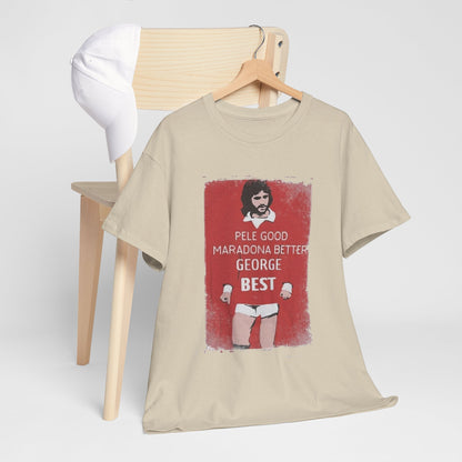 Sophisticated presentation of George Best Football Legend T-Shirt draped over a chair alongside a cap, showcasing the vintage graphic 'Pele Good, Maradona Better, George Best'.