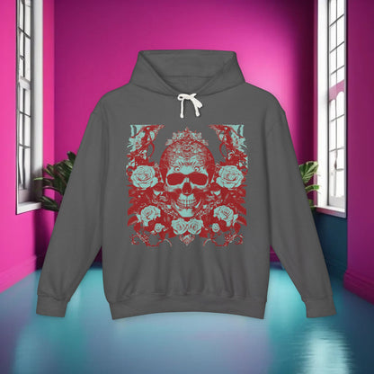 Skull and Roses Lightweight Hoodie showcased against a vibrant pink wall, featuring intricate rose and skull designs for a chic, edgy look.