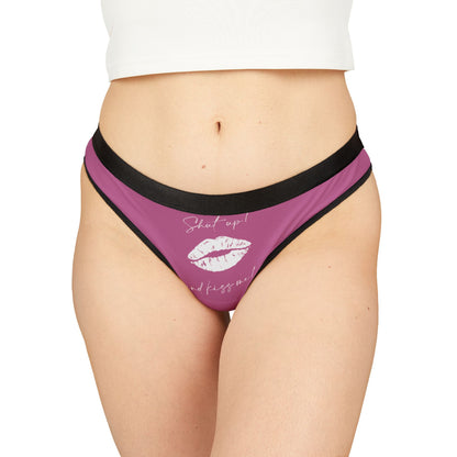 Cheeky women's thong featuring a playful design with the phrase 'Shut up! and kiss me!' adorned with a kiss silhouette, perfect for romantic occasions like Valentine's Day or anniversaries. Crafted for comfort and style, this luxurious lingerie piece adds a touch of humour to intimate moments.