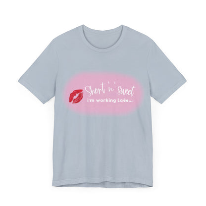 Sabrina Carpenter Inspired Unisex Short Sleeve Tee featuring vibrant lipstick print, elegantly designed in light blue. A chic statement piece showcasing music passion.