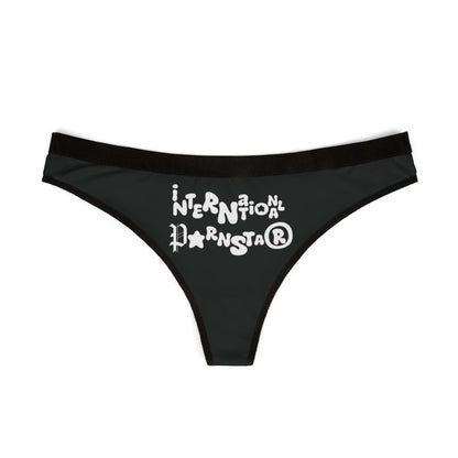 Elegant black thong featuring playful white graphic design stating 'INTERNATIONAL Pornstar®'. Perfect for a cheeky addition to your lingerie collection.