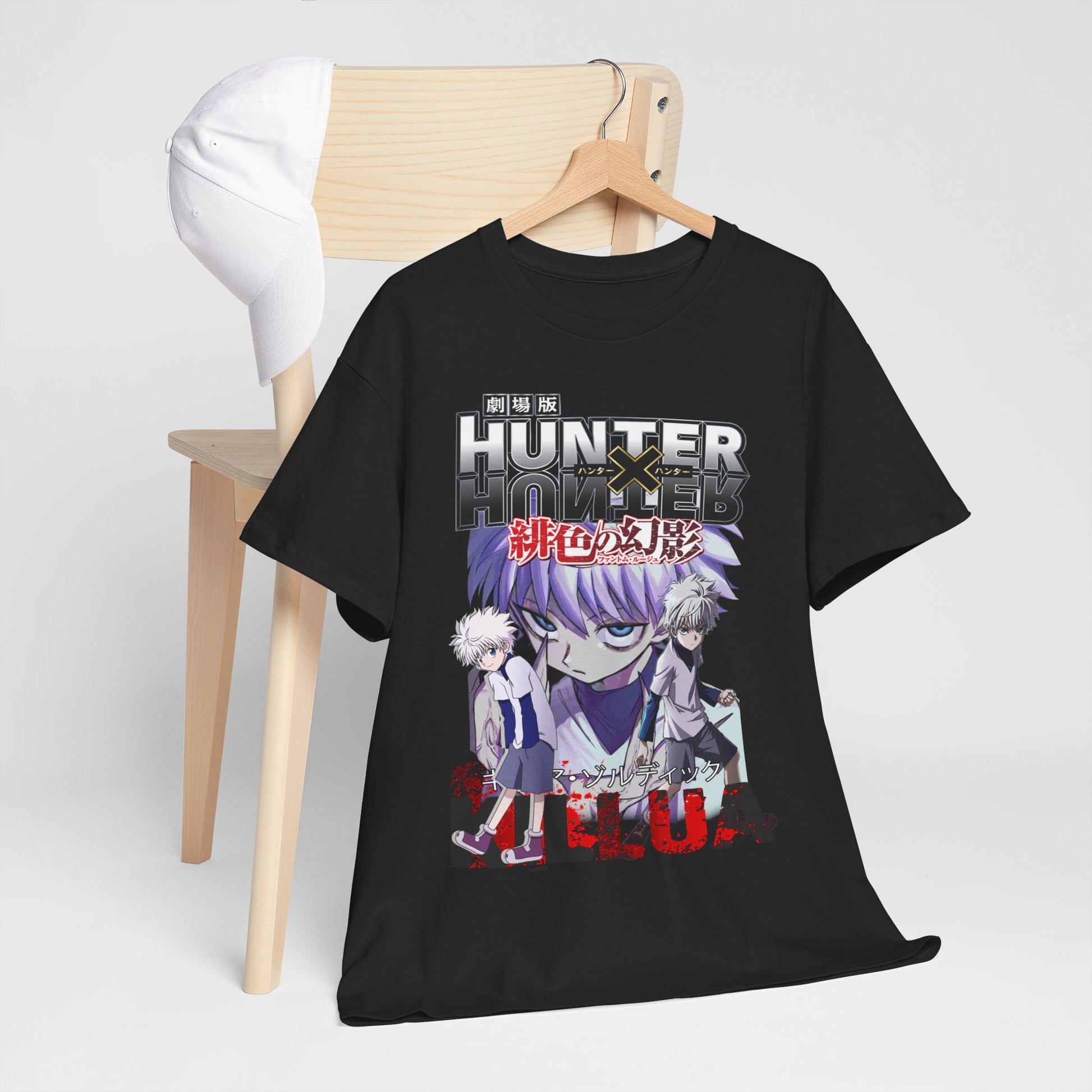 Chic 'Hunter x Hunter' t-shirt artfully placed on a wooden chair alongside a hat, highlighting its unique anime design, a statement piece for passionate collectors.