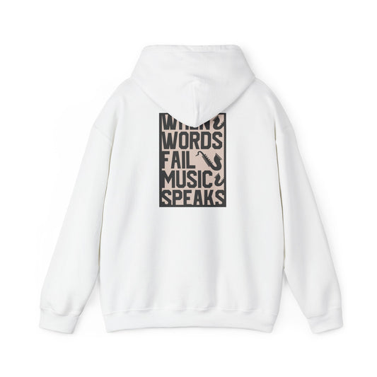 Elegant white hoodie featuring a bold back print with the phrase 'WHEN WORDS FAIL MUSIC SPEAKS' in black typography alongside a sophisticated saxophone design, epitomising style and a passion for music.