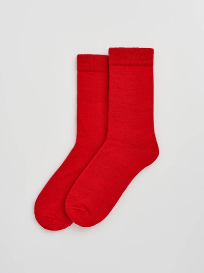 Close-up view of Merino Wool calf-length socks, highlighting the quality fabric blend of 60% Merino, offering luxurious softness and durability.