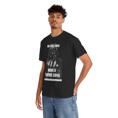 Male model wearing a Darth Vader Star Wars unisex mens graphic cotton funny t-shirt with the phrase 'Do You Even Have a Theme Song?' confidently posed against a minimalist background, highlighting the bold design suitable for luxury fans of pop culture.