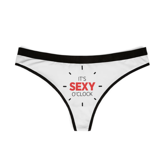 Elegant women's thong with a bold design proclaiming 'IT'S SEXY O'CLOCK', perfect for adding a touch of fun and allure to any lingerie collection.