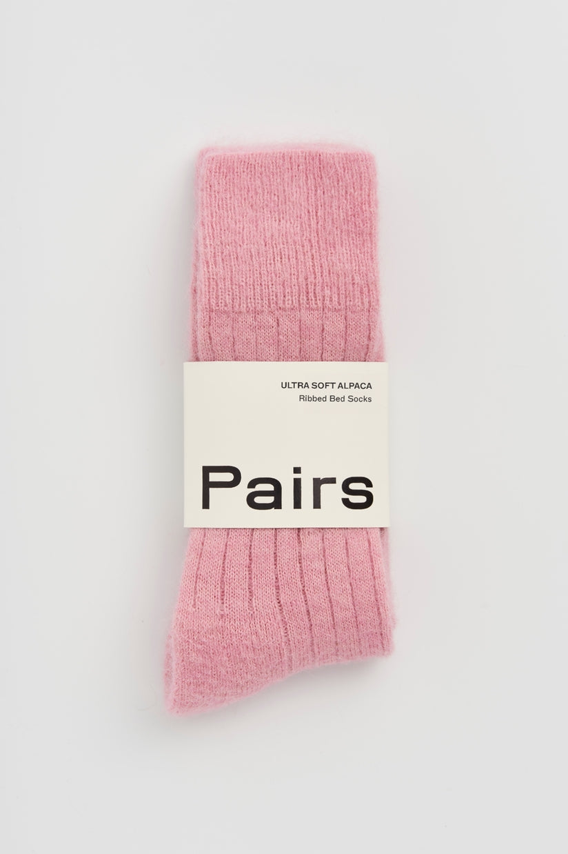 Premium quality ultra soft alpaca bed socks with chic ribbed design, perfect for a lavish sleep experience.