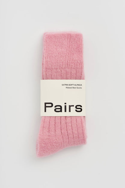 Premium quality ultra soft alpaca bed socks with chic ribbed design, perfect for a lavish sleep experience.