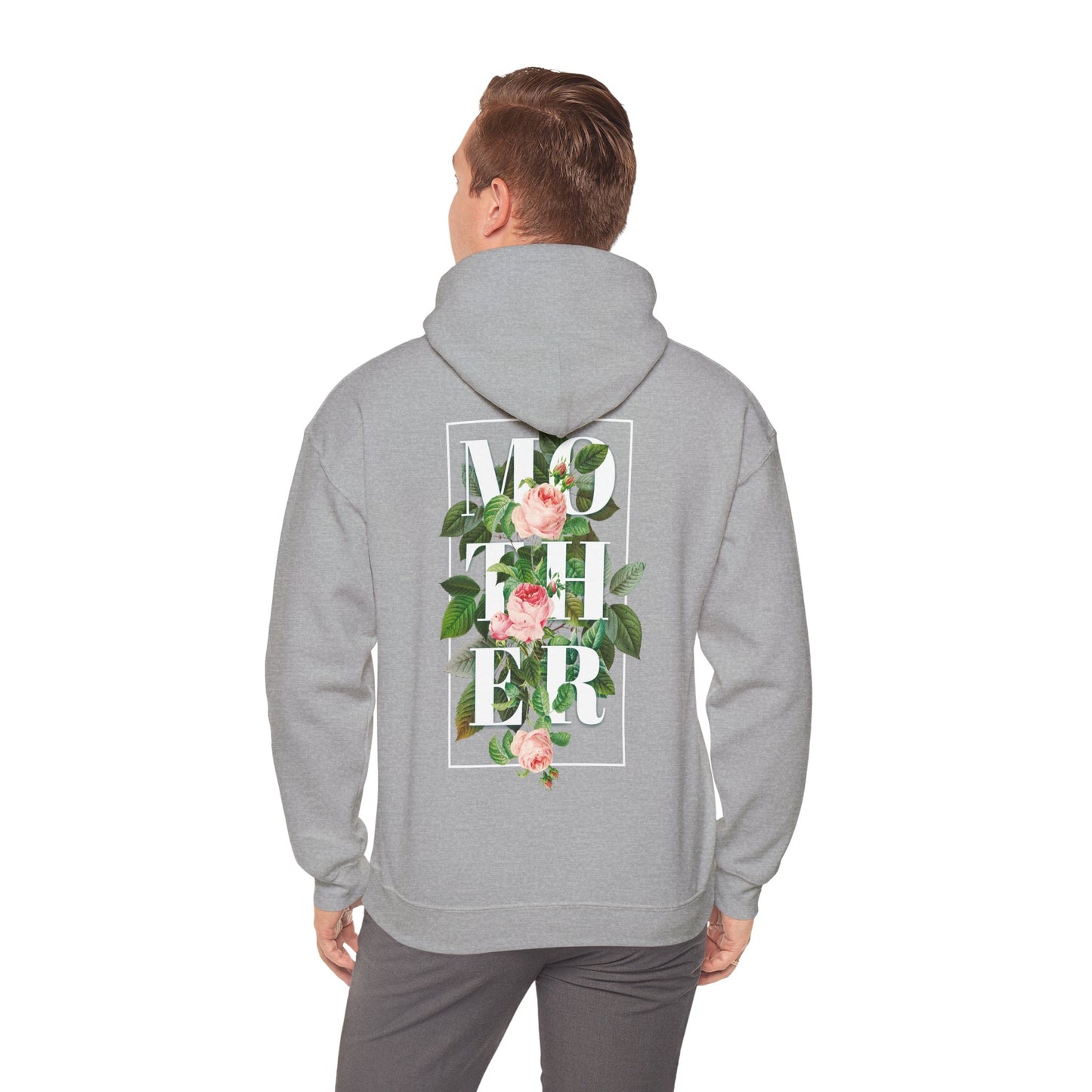 Man wearing a sophisticated grey hoodie with an intricate floral 'MOTHER' design on the back, blending style and sentiment.