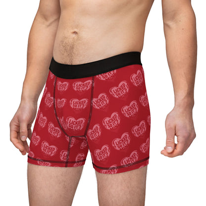 Model wearing Valentines Naughty Cheeky Men's Boxer Briefs, highlighting the cheeky design with 'I LICKED IT SO IT'S MINE' in heart graphics, combining humour and style for a unique Valentine's gift.