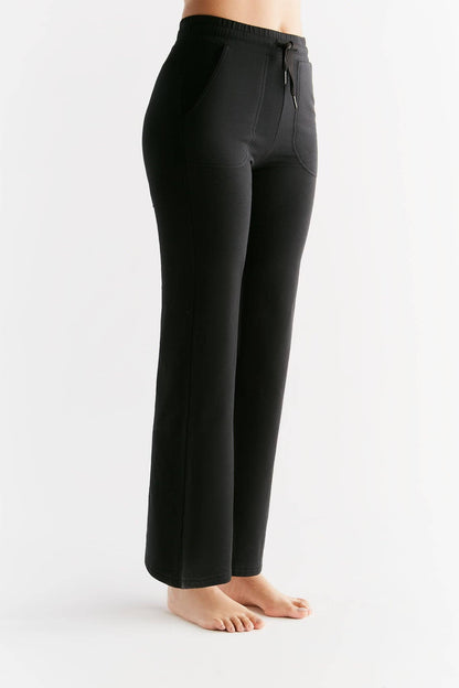 Luxury eco-friendly Tencel women's sweatpants in a well-lit setting, showcasing the soft texture and elegant design.