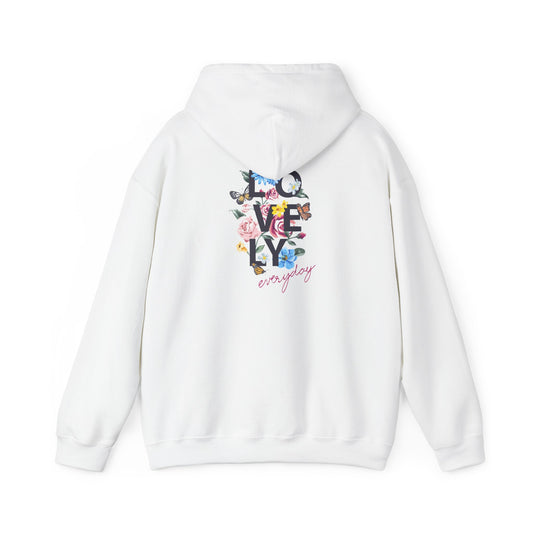 Elegant white hoodie featuring a vibrant floral back print with the word 'LOVELY' in bold typography. Ideal for adding a touch of nature-inspired luxury to your wardrobe.