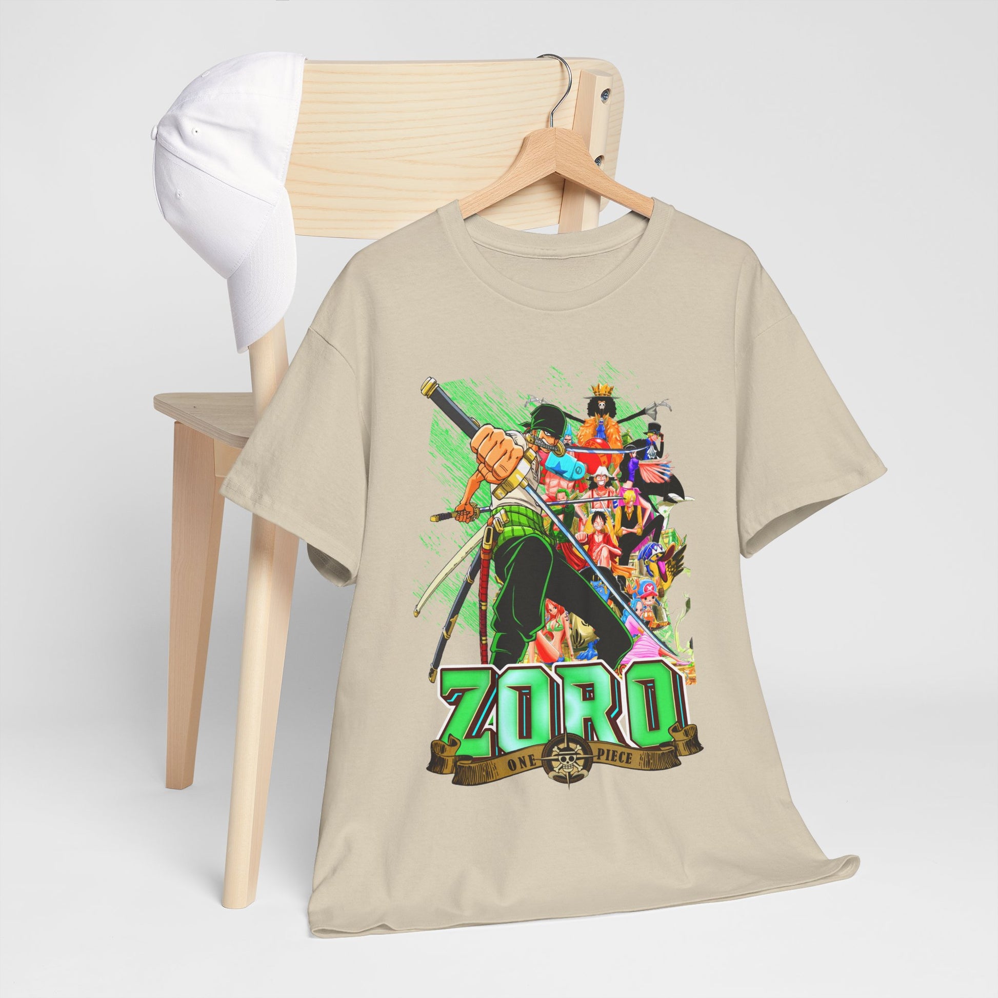Chic One Piece Zoro T-shirt elegantly draped over a wooden chair alongside a cap, highlighting its artistic design and vibrant colours for a contemporary look.