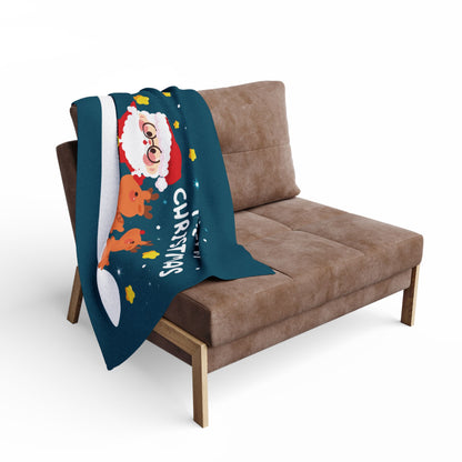 Decorative and Warm Christmas Arctic Fleece Blanket elegantly draped over a stylish sofa, showcasing a delightful Santa Claus design with two reindeer, perfect for enhancing your festive decor.