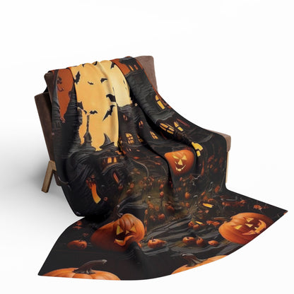 Stylish Decorative and Warm Halloween Spooky Arctic Fleece Blanket draped over a stylish chair, displaying a vibrant Halloween scene with pumpkins and an enchanting atmosphere.
