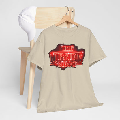 Luxurious unisex graphic tee featuring 'THE UPSIDE DOWN' design from Stranger Things, showcased on a stylish wooden chair with a cap.