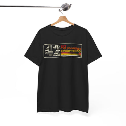 Elegant T-shirt from Hitchhiker's Guide to the Galaxy hanging on a wooden hanger, showcasing a sophisticated graphic of '42 LIFE, THE UNIVERSE, EVERYTHING' in a luxurious retro style.