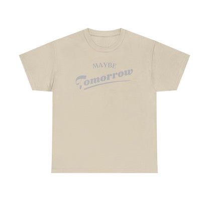Stylish beige t-shirt displaying the whimsical text 'MAYBE Tomorrow' in a subtle silver font, ideal for a relaxed yet fashionable look.