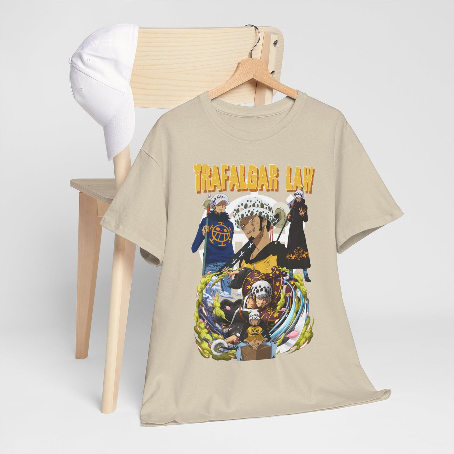 Chic Trafalgar Law Men's T-Shirt draped over a chair, paired with a cap, reflecting modern urban styling for anime fans.