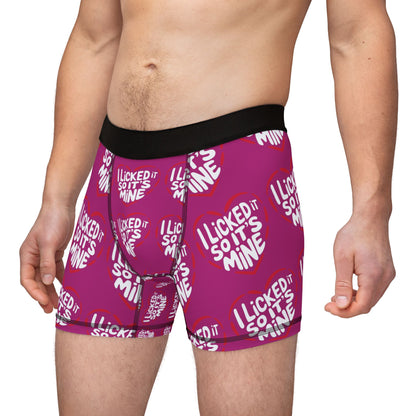 Elegant Valentine's Naughty Cheeky Men's Boxer Briefs worn by a model, displaying the witty slogan 'I LICKED IT SO IT'S MINE' on a sharp purple background, a luxurious addition to any romantic wardrobe.