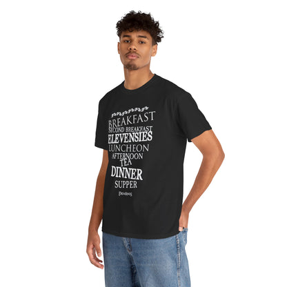 Elegant black t-shirt worn by a stylish young man, showcasing a playful design themed around Hobbit meals from Tolkien's lore, perfect for casual outings.