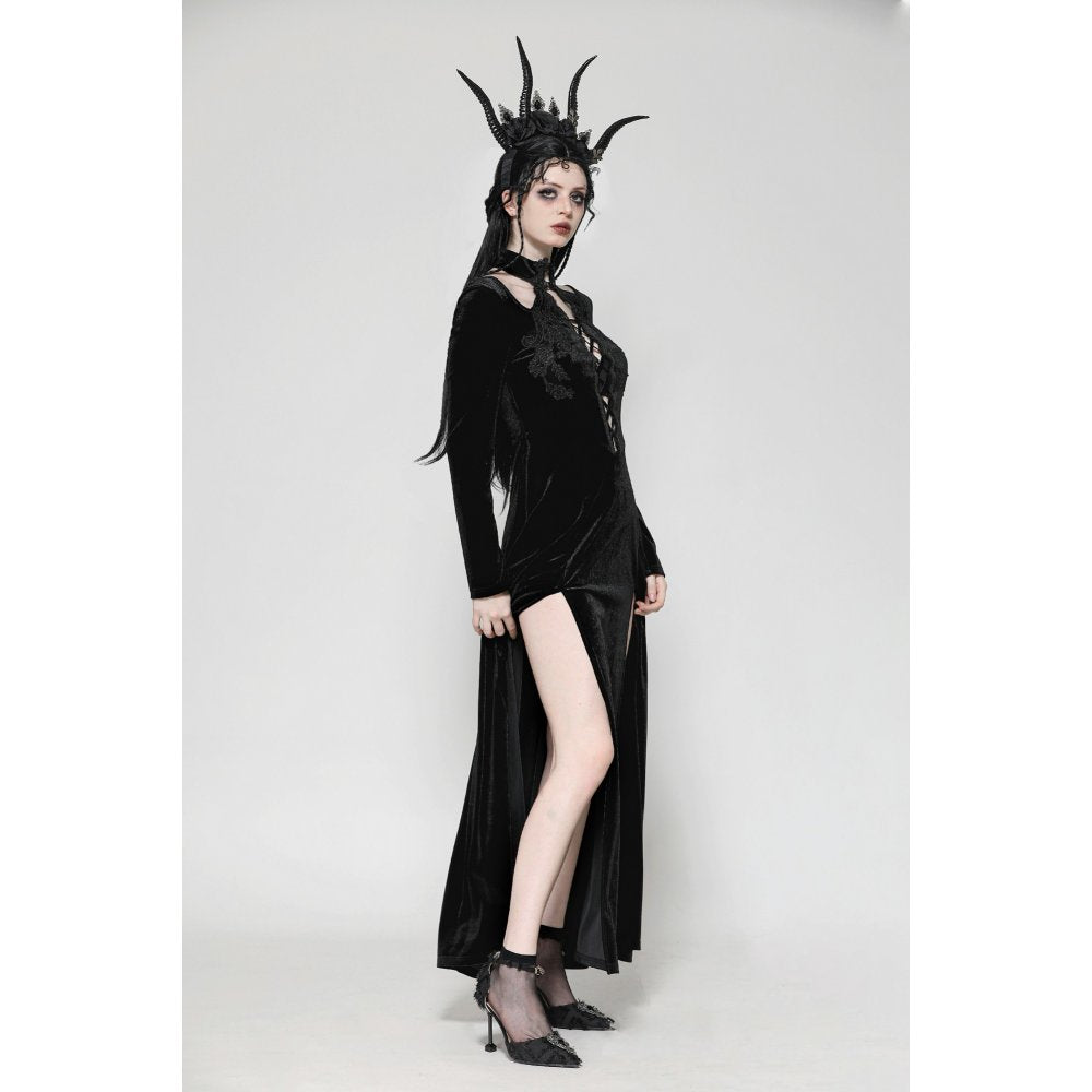Luxury dark velvet high-slit maxi dress featuring a gothic lace-up design and hollow neckline, modelled in elegant pose.