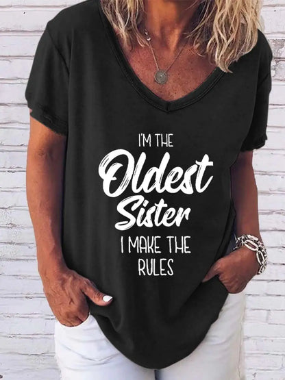 Elegant cotton blend tee by Dazzling Dreams Studio for confident eldest sisters, featuring bold 'I'm The Oldest Sister' print.