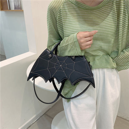 Elegant black Halloween Spider Web Shape Shoulder Bag featuring a stylish batgirl design, ideal for making a bold fashion statement this autumn.