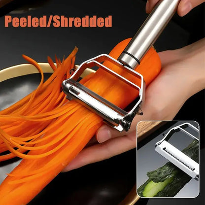 Close-up of a stainless steel vegetable peeler shredding a carrot, showcasing its razor-sharp blade and ergonomic handle for efficient peeling.