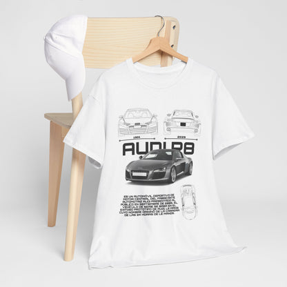 Stylish Audi R8 blueprint t-shirt hanging on a wooden chair next to a white cap, showcasing a modern yet vintage look for automobile lovers.