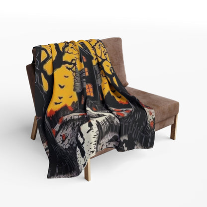 Decorative and Warm Halloween Spooky Arctic Fleece Blanket elegantly draped over a chic armchair, displaying a striking Halloween motif against a dramatic backdrop, enhancing any stylish living space.