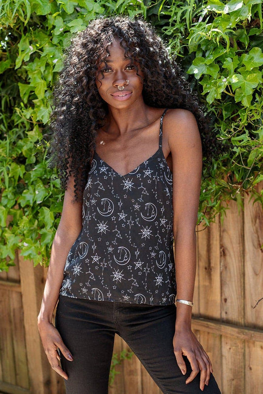 Chic back view of the Moonprint Chiffon Strappy Cami Vest Top showcasing its fashionable cross-back design, complemented by a whimsical moon and star motif.