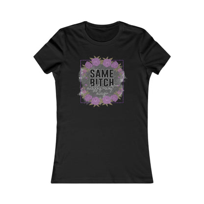 Elegant black women's t-shirt featuring a floral design with the empowering phrase 'Same Bitch Different Day' in bold typography, perfect for showcasing resilience and style.