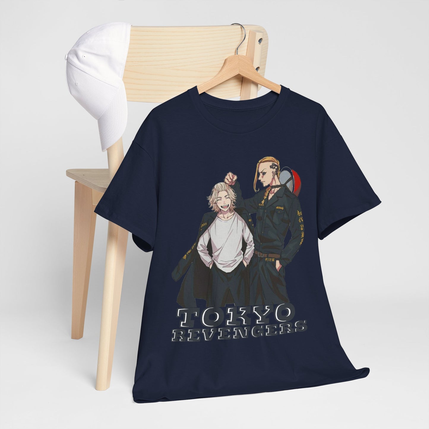 Chic Tokyo Revengers t-shirt styled with a white cap on a wooden chair, blending casual comfort with stylish anime flair.