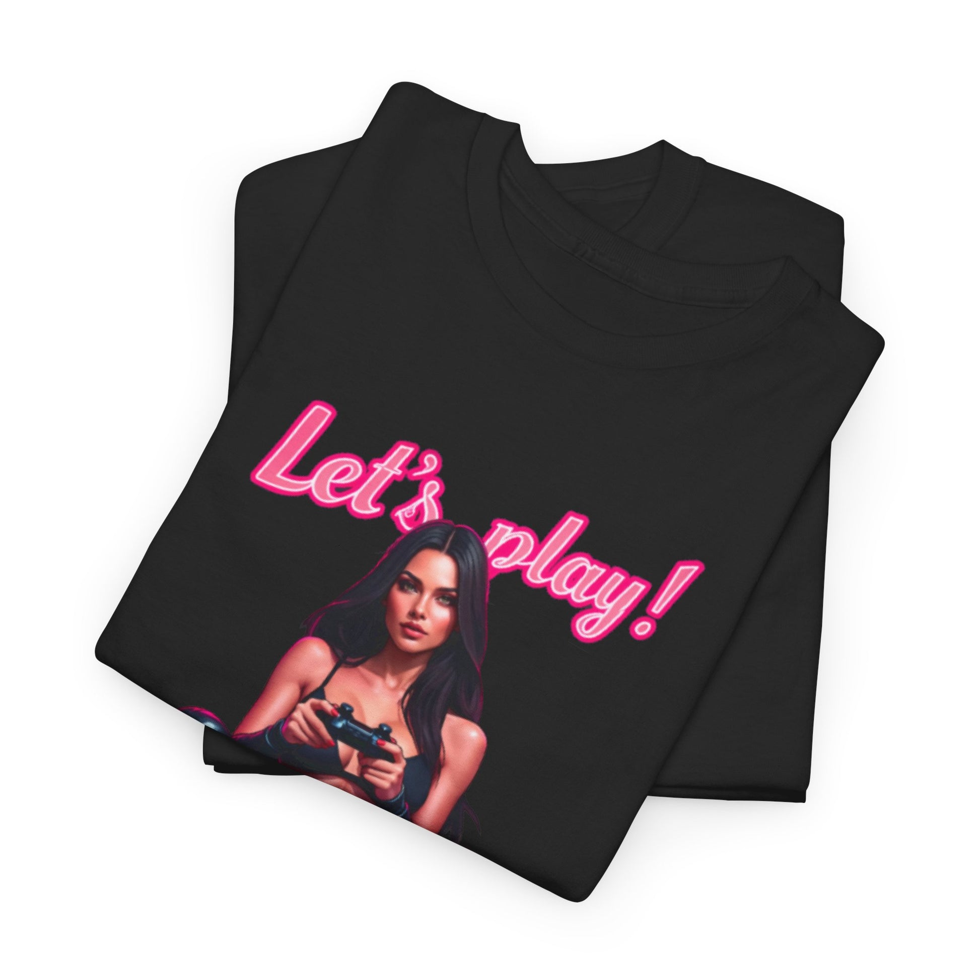 Premium folded black graphic t-shirt featuring an alluring design of a female gamer with a gaming controller, highlighted by striking pink lettering that says 'Let's play!' Perfect for the passionate gaming enthusiast.