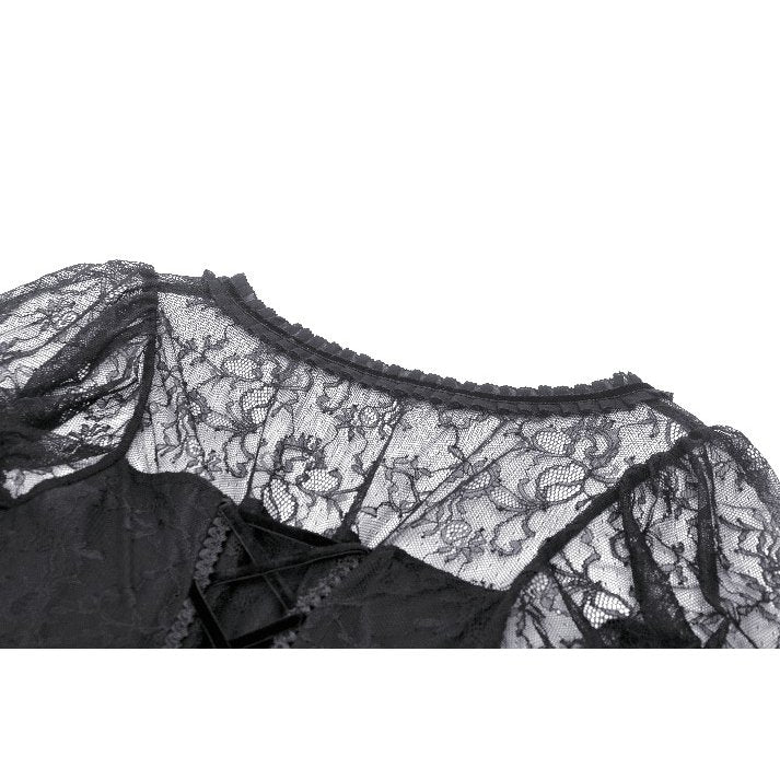 Model elegantly wearing the Merida Lace Tail Dress, emphasizing its unique blend of playful design and luxury.