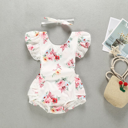 Luxurious 100% Cotton Floral Romper for Baby Girls featuring elegant floral design and soft puff sleeves, perfect summer fashion for ages 70-100cm.