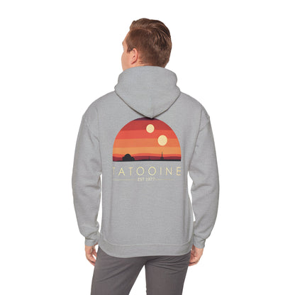 Lifestyle shot featuring the Stunning Tatooine Sunset Back Print Hoodie, perfect for both casual wear and cosmic adventures.