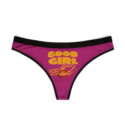 Elegant women's thong showcasing the confident phrase 'Good Girl Gone Bad' in striking yellow and orange lettering on a chic pink fabric, perfect for those who embrace their sassy side.