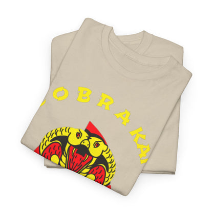 High-quality Cobra Kai T-shirt elegantly stacked, featuring the iconic yellow snake design on a soft beige fabric, ideal for casual wear.