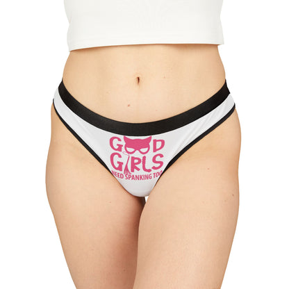 Luxury women's thong featuring playful text 'Good Girls Need Spanking Too' in vibrant pink against a stylish white backdrop, perfect for adding a cheeky touch to intimate apparel.