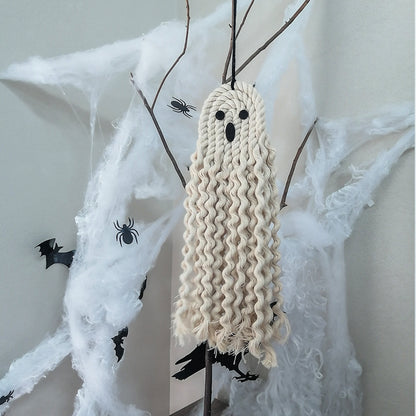 Tasteful Halloween Ghost Hanging Decoration presenting a charming ghost with playful expressions, elegantly hung near a spooky scene with cobwebs and bats, enhancing your holiday decor with a touch of sophistication.