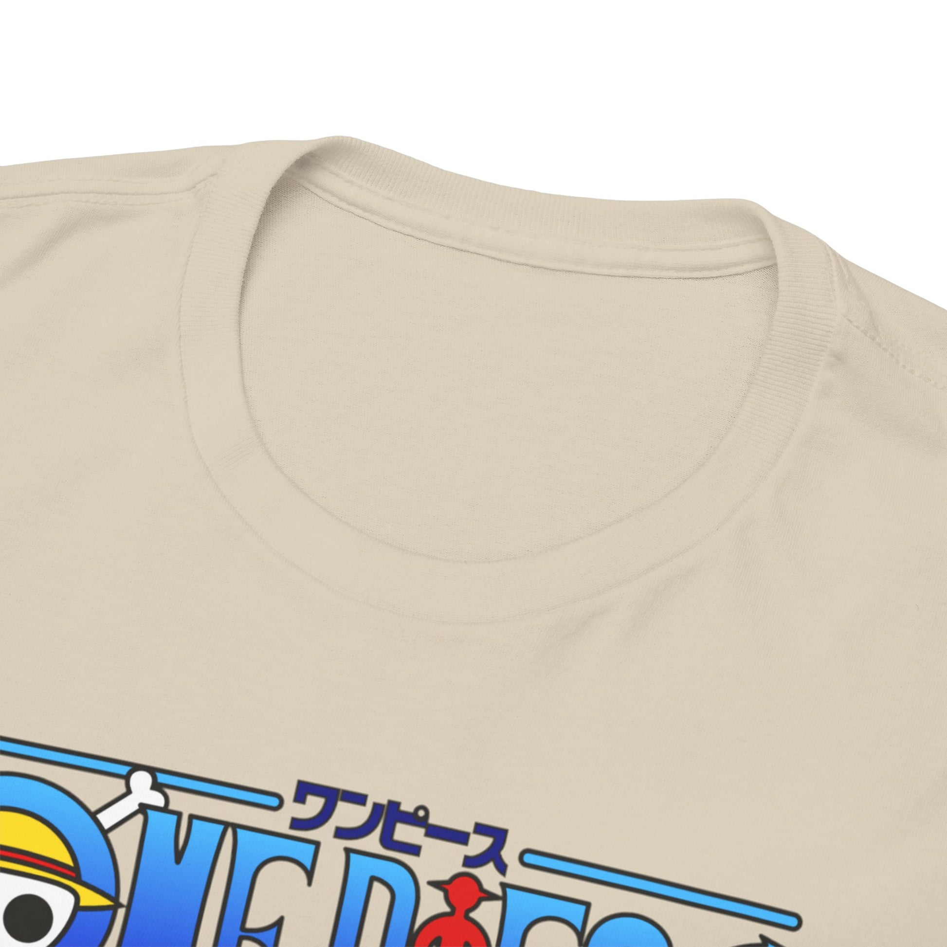 Close-up view of the sophisticated neckline of a beige men's t-shirt, featuring an impressive One Piece graphic that celebrates the powerful character Trafalgar Law.