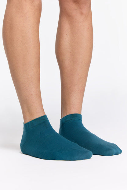 Luxury pack of six organic cotton trainer socks with detailed view on the fine elastane cuff providing both style and comfort.