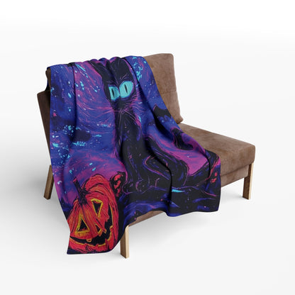 Elegant display of the Decorative and Warm Halloween Spooky Arctic Fleece Blanket draped over a stylish chair, featuring striking Halloween motifs for an upscale seasonal touch.