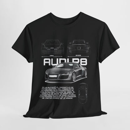 Stylish Audi R8 Blueprint Tee displayed prominently with detailed car illustrations and Spanish text, celebrating the prestigious legacy of Audi's engineering excellence.