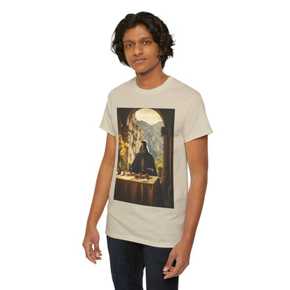 Stylish male model showcasing a beige t-shirt with a vibrant graphic of Darth Vader set in a serene environment, reflecting a blend of modern elegance and playful design.